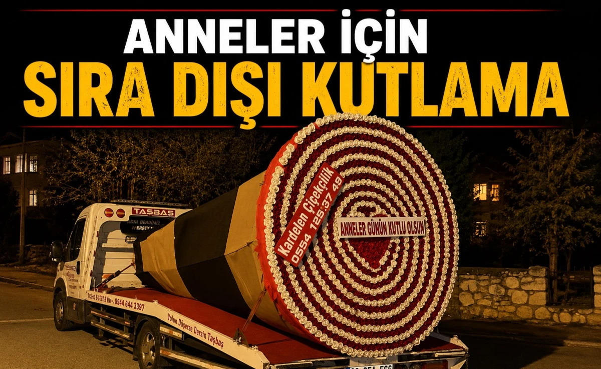 Kurtarıcı &uuml;zerinde dev &ccedil;i&ccedil;ekle Anneler G&uuml;n&uuml; kutlaması